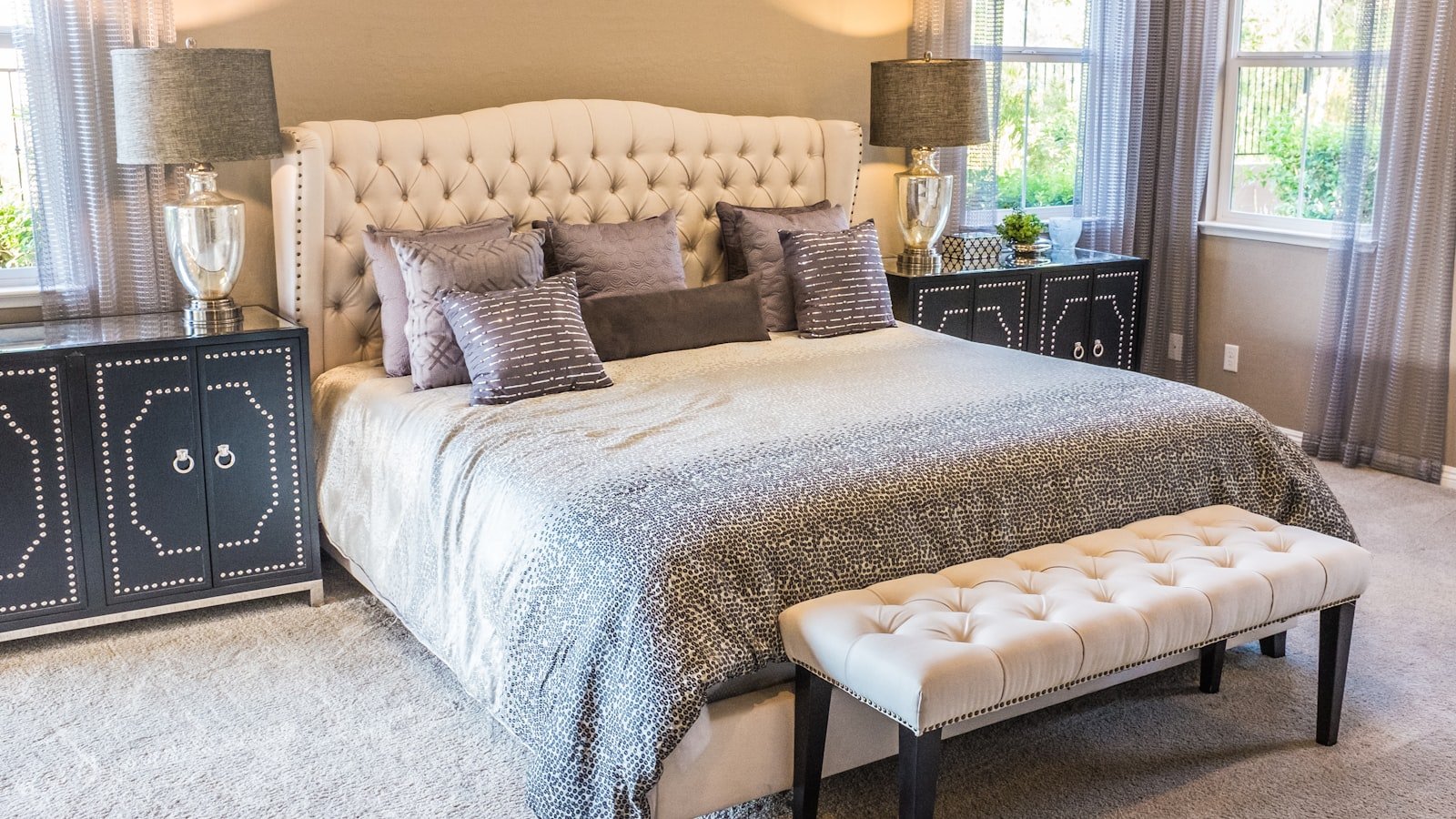 Modern bedroom with neutral mattress and bedding